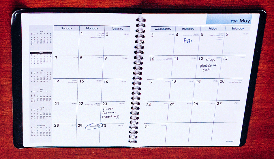 open-calendar-book-on-table-full open-calendar-book-on-table