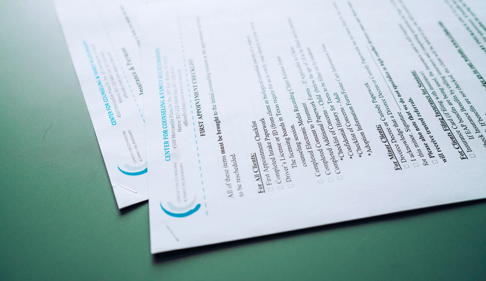 paperwork-forms-full paperwork-forms-laying-on-a-table